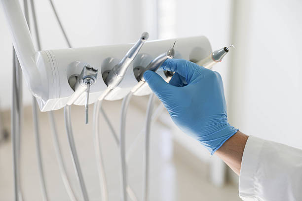Professional Tooth Extraction technician working in Rockport, IN